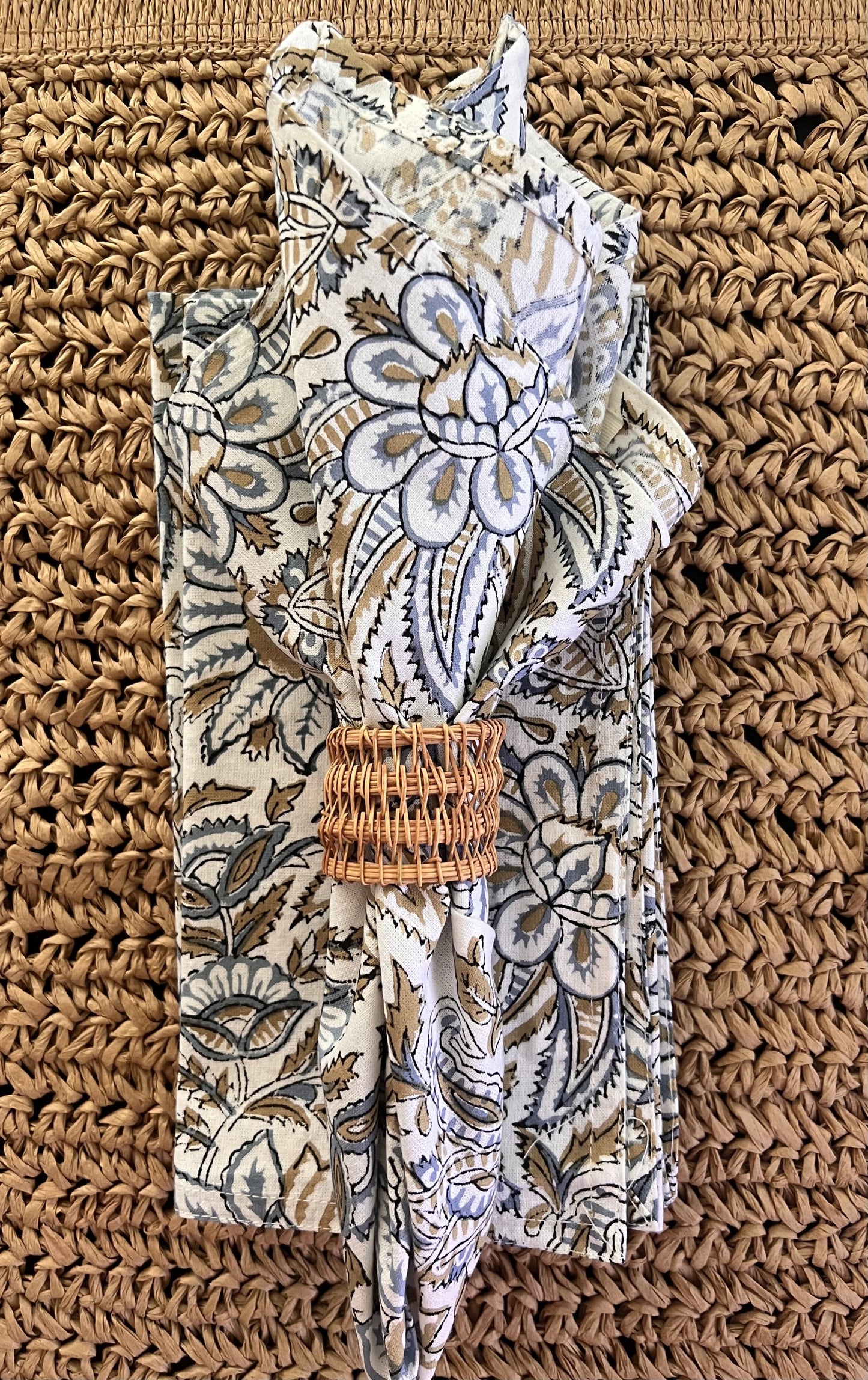 Bromley cotton napkin in cornflower blue with woven napkin ring