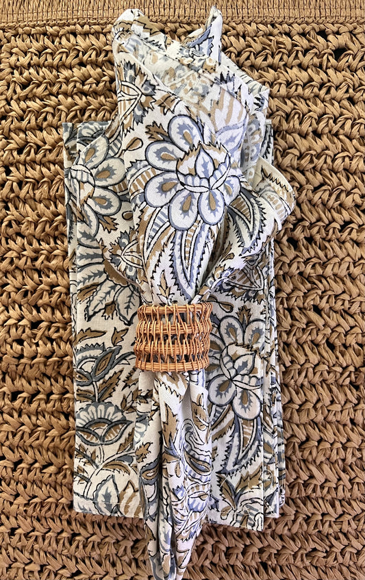 Bromley cotton napkin in cornflower blue with woven napkin ring