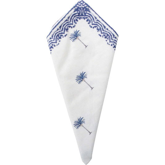 White napkin with blue palm tree design