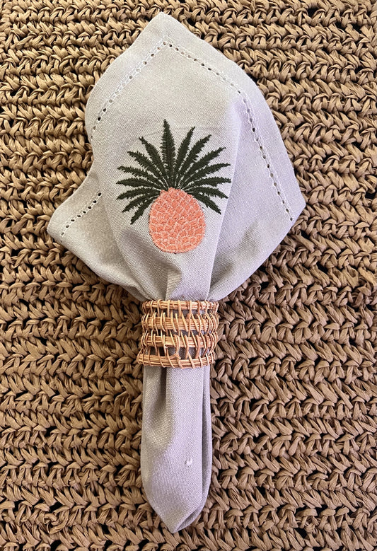 Cotton napkin with pineapple embroidery and woven napkin ring