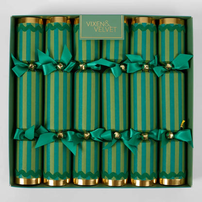 Box of green striped crackers with gold ends and green bows, branded 'Vixen & Velvet'.