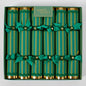 Box of green striped crackers with gold ends and green bows, branded 'Vixen & Velvet'.